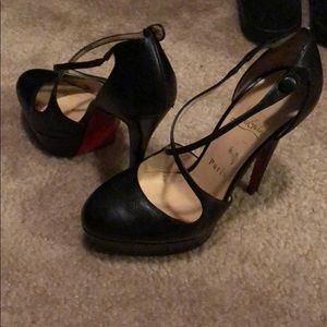 Sexy black Louboutin pumps